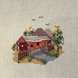 Counted Cross-Stitch completed 8”x12” panel of a Covered Bridge